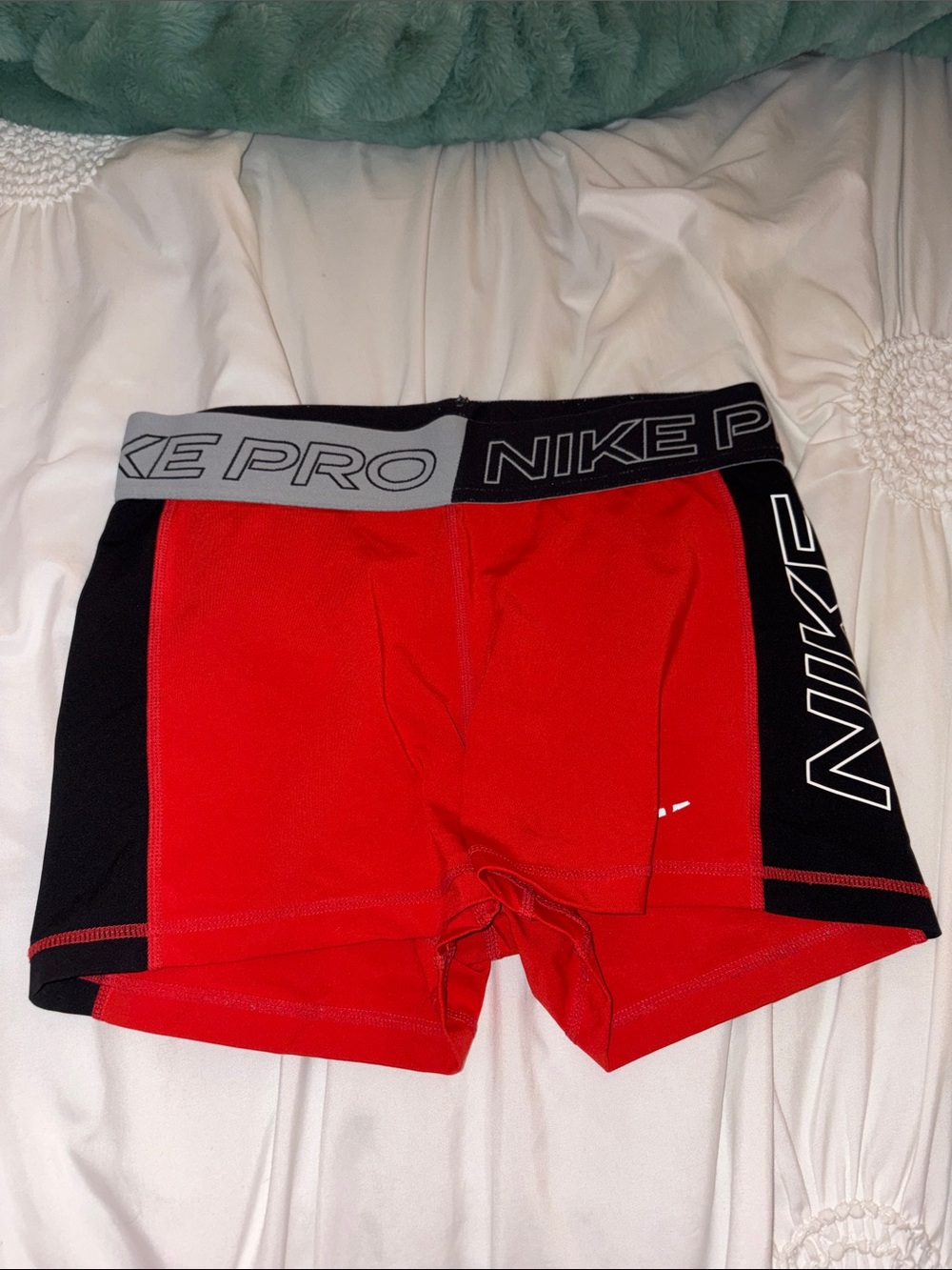 Orange Nike Pros- Women’s medium